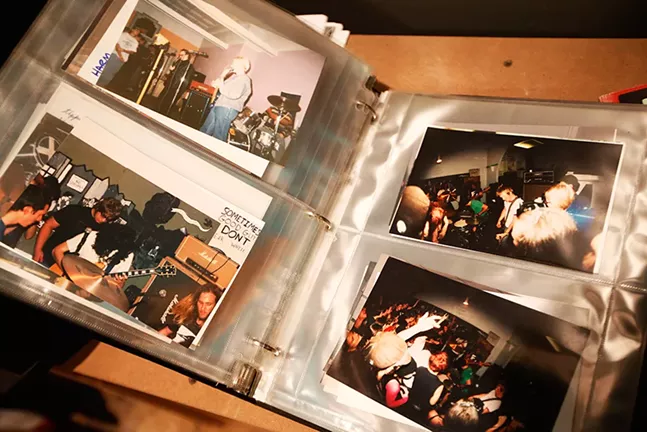 The Mr. Roboto Project has photo albums of past shows on display in its zine library - CP PHOTO: JARED WICKERHAM