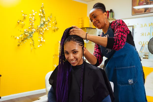 CP staff writer Jordan Snowden getting her hair braided at Elevationz in Hazelwood - CP PHOTO: JARED MURPHY