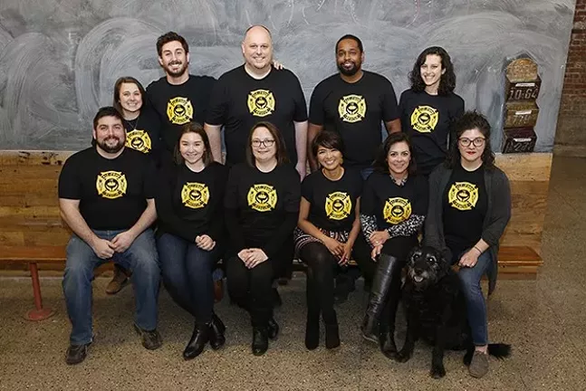The staff of 412 Food Rescue: From left, first row: Ryan Geraghty, Becca Sufrin, Jen England, Leah Lizarondo, Sara Swaney, and Mel Cronin; Standing from left: Jaclyn Janeczko, Jake Tepperman, Anthony Levin-Decanini, Leland Scales, and Hana Uman; Not pictured: Dan Scullin and Gregg Brunner - CP PHOTO: JARED WICKERHAM