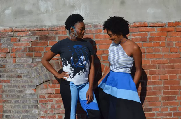 Rayne Eleese and Ronnell wearing items (with pockets) from The Blue Collection, a collaboration of Idia’Dega + OMWA + The Beading Wolves - TERENEH IDEA