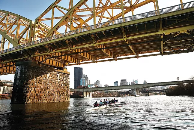 Members of the boys and girls junior Three Rivers Rowing Association teams practice on the Allegheny River. - CP PHOTO: JARED WICKERHAM