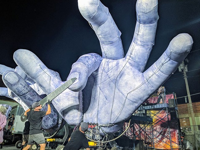 The 'horrifying and comic' Hand to Hand features steampunks, jam-band prog, and two 600-pound animatronic hands