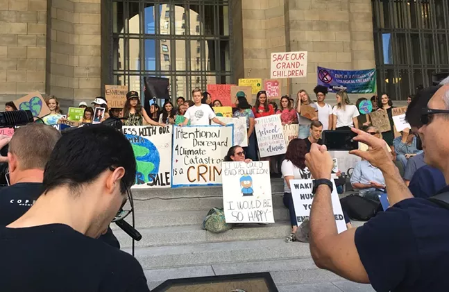 Students gather on the steps of the City-Council Building for the Global Climate Strike in Pittsburgh. - CP PHOTO: AMANDA WALTZ