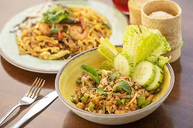 Laab (minced chicken, fish sauce, toasted rice, lemongrass, scallion, cilantro, mint leaves, and lime served with sticky rice) - PHOTO: KIIN LAO & THAI EATERY