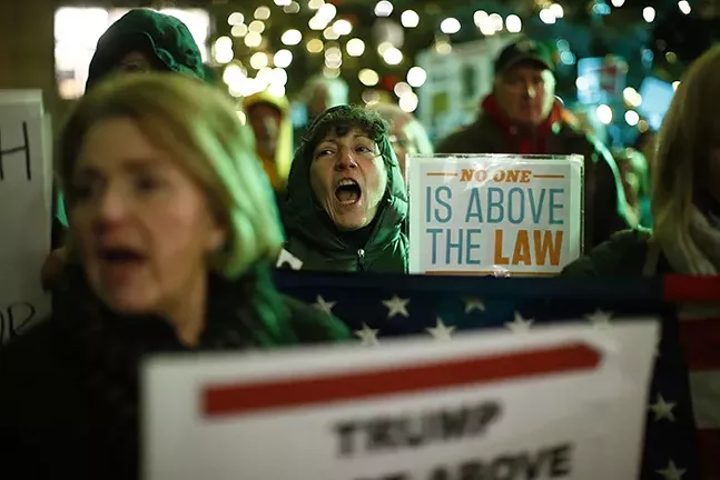 Hundreds rally in Downtown Pittsburgh in support of the impeachment of President Trump - CP PHOTO: JARED WICKERHAM