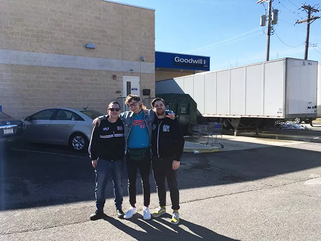 Josh Larkin, Toddy Tondera, and Ryan Thompson outside Goodwill Outlet Center. - CP PHOTO: AMANDA WALTZ