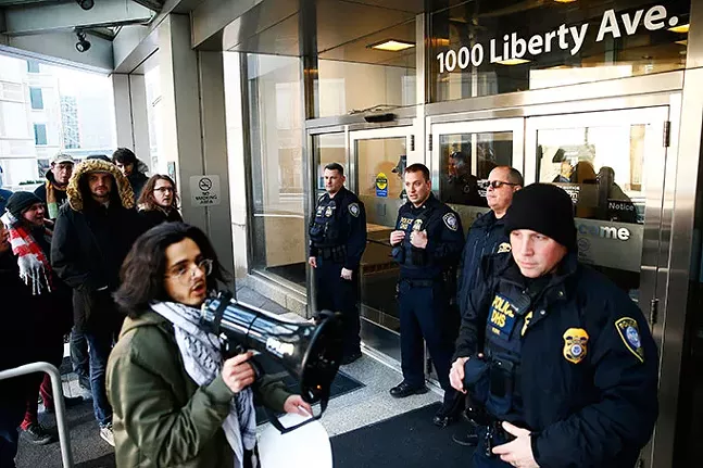 An anti-war protest put on by the Pittsburgh Anti-Imperialism Committee outside the Federal Building in Downtown Pittsburgh on Mon., Jan. 6 - CP PHOTO: JARED WICKERHAM