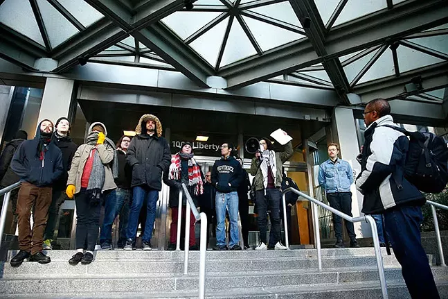 An anti-war protest put on by the Pittsburgh Anti-Imperialism Committee outside the Federal Building in Downtown Pittsburgh on Mon., Jan. 6 - CP PHOTO: JARED WICKERHAM