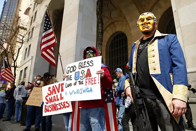 The "Take Back Control" rally in protest of Governor Wolf's stay-at-home order outside of the City-County building in Downtown Pittsburgh on Mon., April 20. - CP PHOTO: JARED WICKERHAM