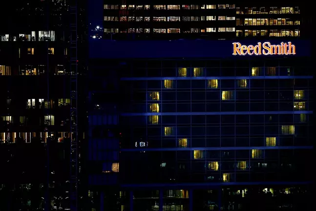 A heart-shaped array of lights on the Reed Smith building during #LoveFromPGH’s “Illuminiation Ovation” Event on Tue., April 7, 2020. - CP PHOTO: JARED WICKERHAM