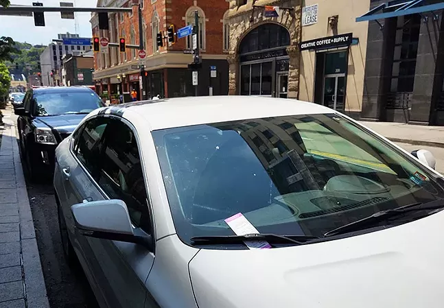 Cars parks on Smithfield Street in Downtown Pittsburgh on Mon., May 18, 2020. - CP PHOTO: KEVIN SHEPHERD