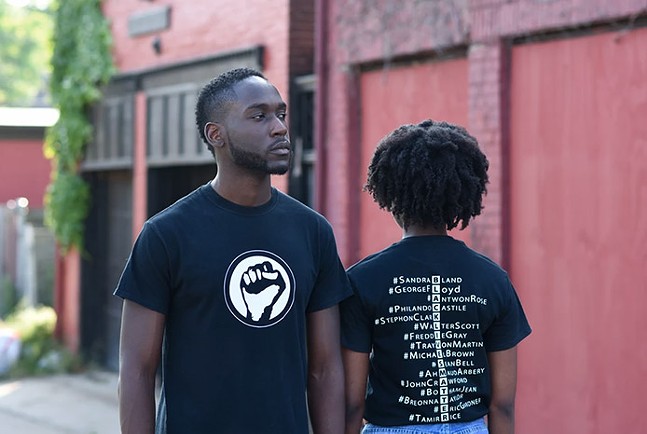Moya Omololu and Amina Jones modeling Omololu's Black Lives Matter T-shirt design - ©SARAH BADER