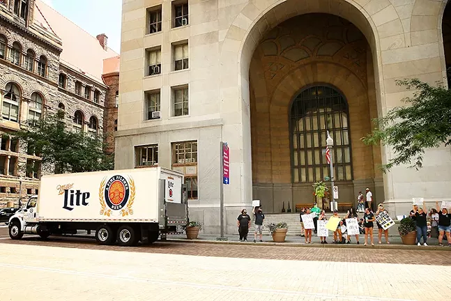 Protesters, including restaurant owners and bartenders, rally in front of the City-County Building in Downtown Pittsburgh on Thu., July 2, 2020. - CP PHOTO: JARED WICKERHAM