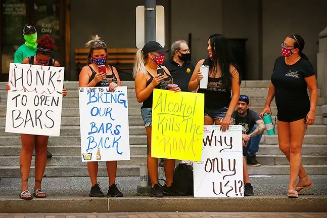 Bar owners and bartenders rallied in front of the City-County Building in Downtown Pittsburgh in disapproval of the governor's orders to shut down all bars amidst rising positive cases of coronavirus on Thu., July 2, 2020. - CP PHOTO: JARED WICKERHAM