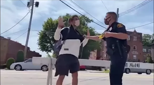 Screenshot of the arrest at the Squirrel Hill farmers' market on Sun., Sept. 6 - SCREENSHOT TAKEN FROM VIDEO SHARED WITH PITTSBURGH CITY PAPER