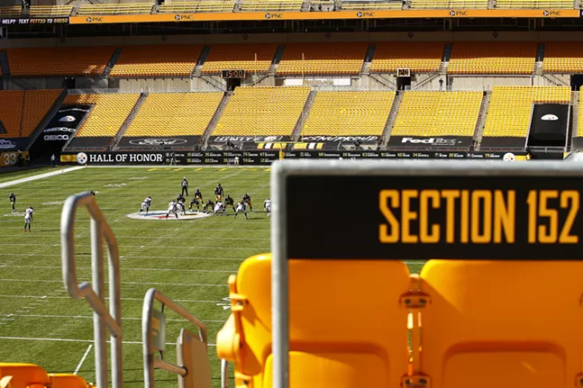An empty Heinz Field as the Pittsburgh Steelers offense drives down the field against the Denver Broncos. - CP PHOTO: JARED WICKERHAM
