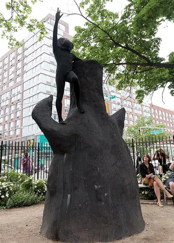 Rudy Shepherd (costumed) performs atop an earlier version of his sculpture "Black Rock Negative Energy Absorber," in New York City. - PHOTO COURTESY OF E.F. ROSSARD