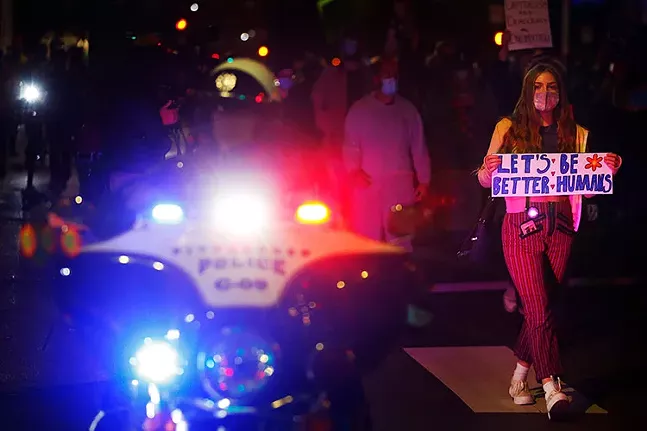 Protesters with the “Don’t Let Trump Steal The Election" rally march through Downtown Pittsburgh on Wed., Nov. 4, 2020. - CP PHOTO: JARED WICKERHAM