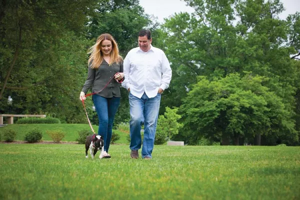 Mayor Bill Peduto and his girlfriend, Caitlin Lasky with Lilly, their recently adopted Boston terrier - PHOTO BY HEATHER MULL