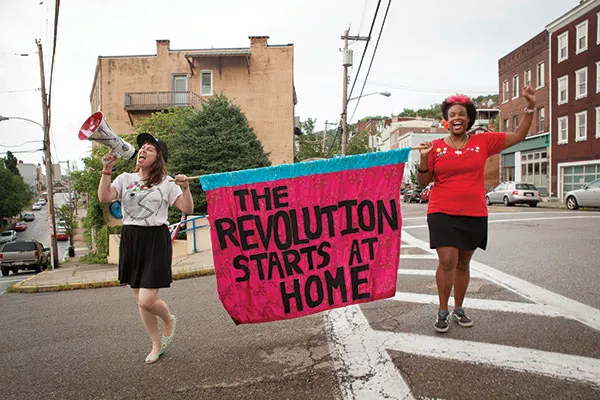 Taking it to the streets: Ladyfest Pittsburgh organizers Steph Flati (left) and Athena Kazuhiro - PHOTO BY HEATHER MULL