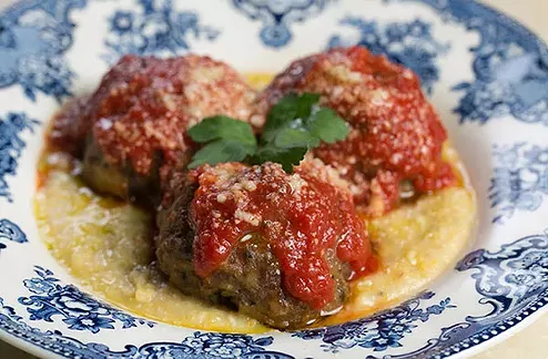 Pork and beef meatballs with tomato sauce, creamy polenta and grana padano cheese - PHOTO BY JOHN COLOMBO