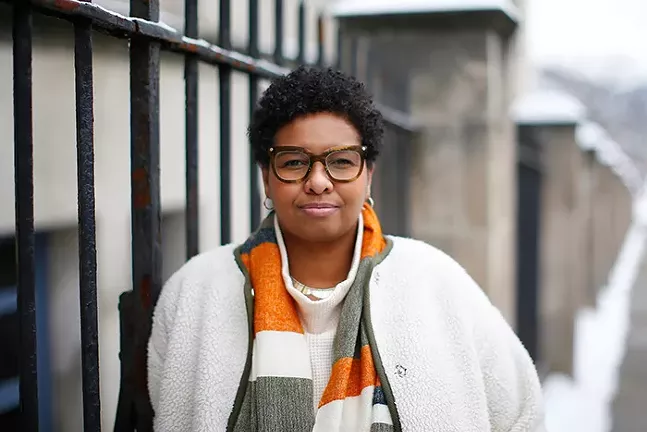 Amber Thompson, member of Black Women For A Better Education, poses for a portrait in front of Arsenal Elementary School in Lawrenceville. - CP PHOTO: JARED WICKERHAM