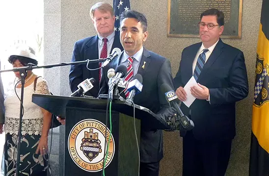 Adnan Hilton Pehlivan, owner of Mediterranean restaurant Istanbul Sofra, speaks at a press conference about positive economic contributions of immigrants. - PHOTO BY RYAN DETO