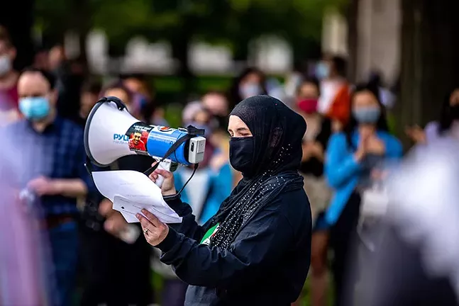 Christine Mohamed gives closing remarks at the Stand in Solidarity with Palestine protest. - CP PHOTO: KAYCEE ORWIG