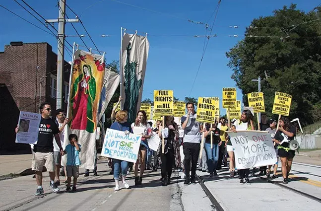 More than 200 activists and concerned citizens at an immigration rally on Sun., Sept 25, 2016 - CP FILE PHOTO