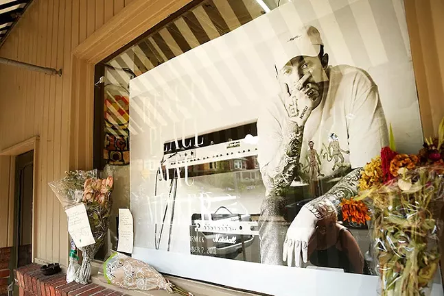 Mac Miller memorial in the window of Frick Park Market, where the late rapper filmed a music video, Sept. 15, 2018 - CP PHOTO: JARED WICKERHAM