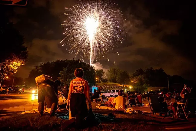 People watch the fireworks from outside the Dormont Swimming Pool on July 4, 2021. - CP PHOTO: KAYCEE ORWIG