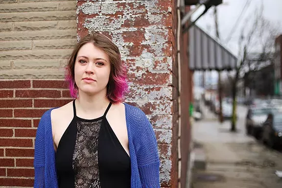 Cora Vercellotti, a former Wylie Holdings tenant, near her apartment in middle Lawrenceville - CP PHOTO BY JOHN HAMILTON