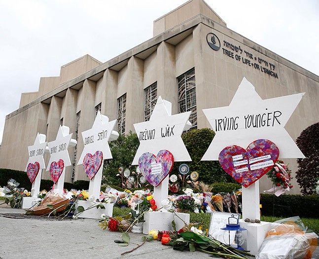 Memorials with names of 11 people killed at Tree of Life Synagogue, shown outside the Squirrel Hill synagogue in October 2018 - CP PHOTO: JARED WICKERHAM