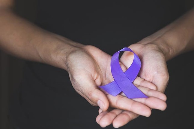 The purple ribbon is a symbol of courage and hope for domestic violence victims