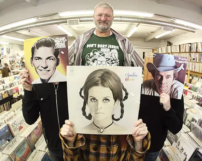 Jerry Weber poses with Pittsburgh band Donora in Jerry's Records after being named "Best place to still buy vinyl" by Pittsburgh City Paper readers in 2009. - CP FILE PHOTO: HEATHER MULL