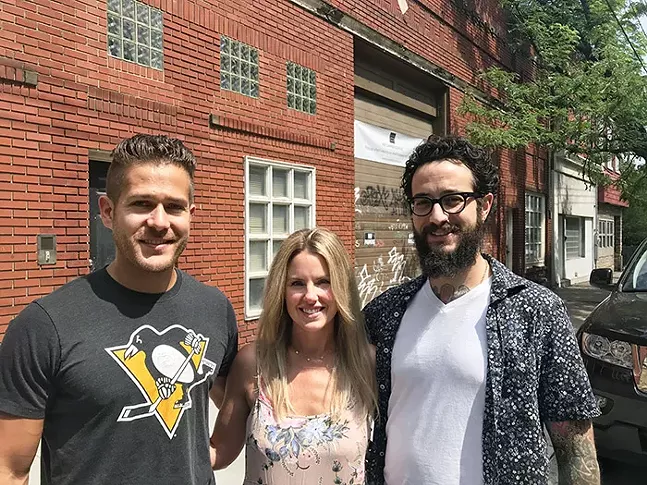 Brett Minarik, Phoebe Fraser, and Adam Harvey, owners of the proposed Lawrence Hall - CP PHOTO: RYAN DETO