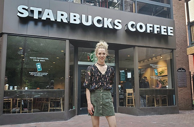 Pittsburgh Starbucks employee Cayla Enis outside the coffeeshop's Market Square location - CP PHOTO: LUCY CHEN