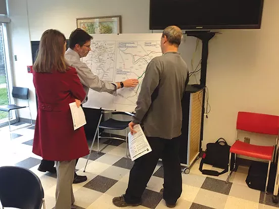 Officials presenting Mon-Fayette Expressway plans to residents, at the Monroeville Public Library - CP PHOTO BY RYAN DETO