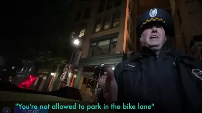 Video shows police officer belittling resident when confronted on illegal parking (2)
