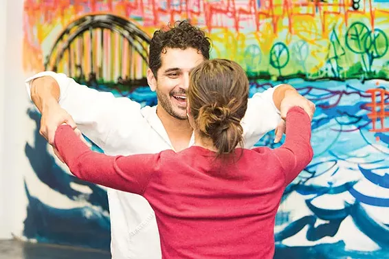 Greg Manley leads Kimberly Bracken in Ludovia, the new game from City of Play. - CP PHOTO BY LUKE THOR TRAVIS