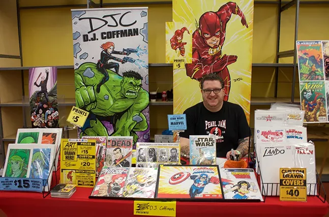DJ Coffman, a Pittsburgh-area comics artist and occasional City Paper contributor, mans his booth at 3 Rivers Comicon on Sun., May 21. - CP PHOTOS BY KRISTA JOHNSON
