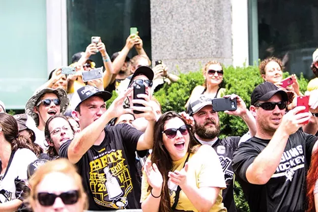 Pens fans cheering on the team during 2016’s Stanley Cup victory parade - CP PHOTO BY LUKE THOR TRAVIS