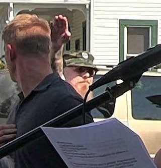 A man who appears to be Hardy Lloyd giving a Nazi salute - PHOTO COURTESY OF MIKE WEIS