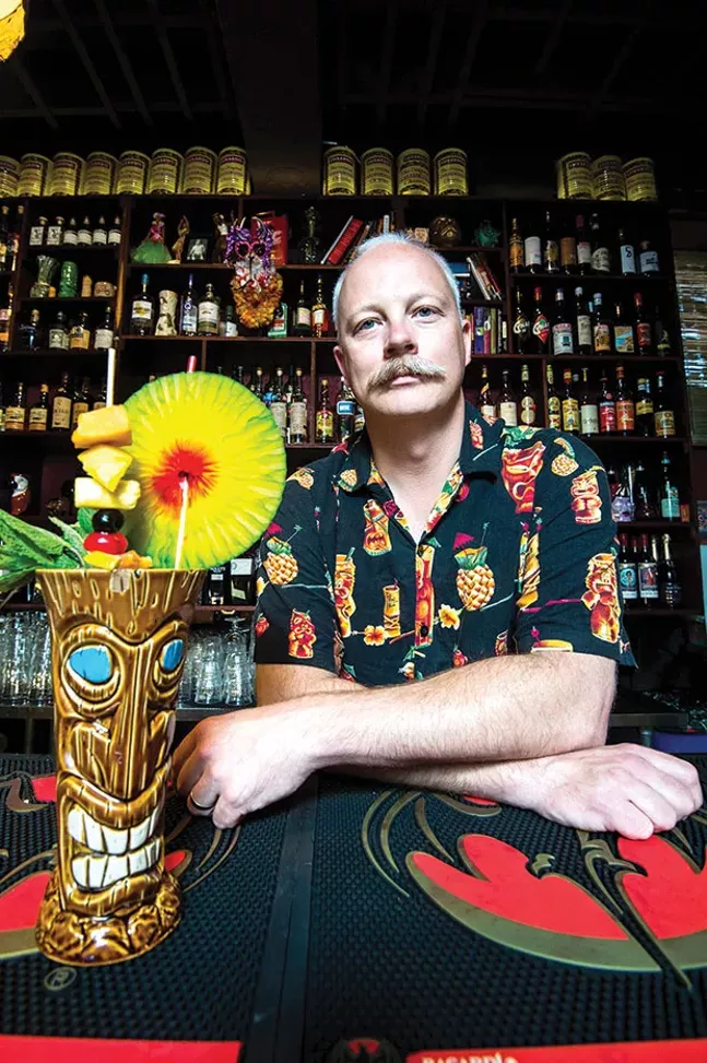 Stefan Was serves creative beverages at Porco Lounge and Tiki Room in Cleveland. - CLEVELAND PHOTO BY KEN BLAZE