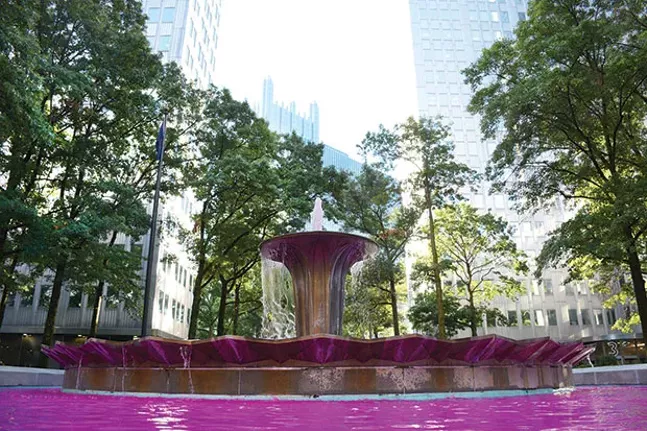 The fountain at Gateway Center in Downtown Pittsburgh is dyed pink this month for breast cancer awareness. - CP PHOTO BY STEPHEN CARUSO