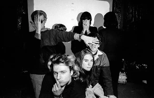 “Group Shot” with Andy Warhol (at left) and Factory habitués - IMAGE: ©ESTATE OF NAT FINKELSTEIN