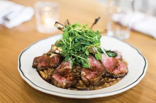 Rack of lamb with mushroom risotto, peashoots and grilled ramp salad from The Whitfield’s lamb menu - CP PHOTO BY JOHN COLOMBO