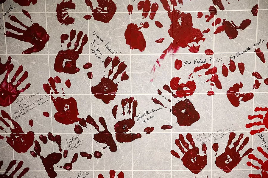 The “Maul of Fame,” signed by cast members and producers is shown at the Night of the Living Dead Museum In Evans City. - CP PHOTO: JARED WICKERHAM