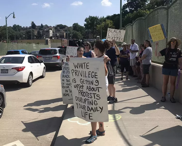 Protesters gathered on the Greenfield Bridge - CP PHOTO: EMILY WOLFE