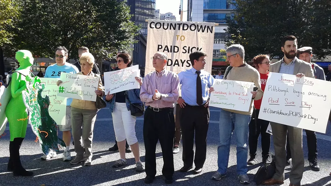 Organizers gathered in 2015 to prepare for city's paid-sick-leave law to go into effect. - CP PHOTO: ASHLEY MURRAY
